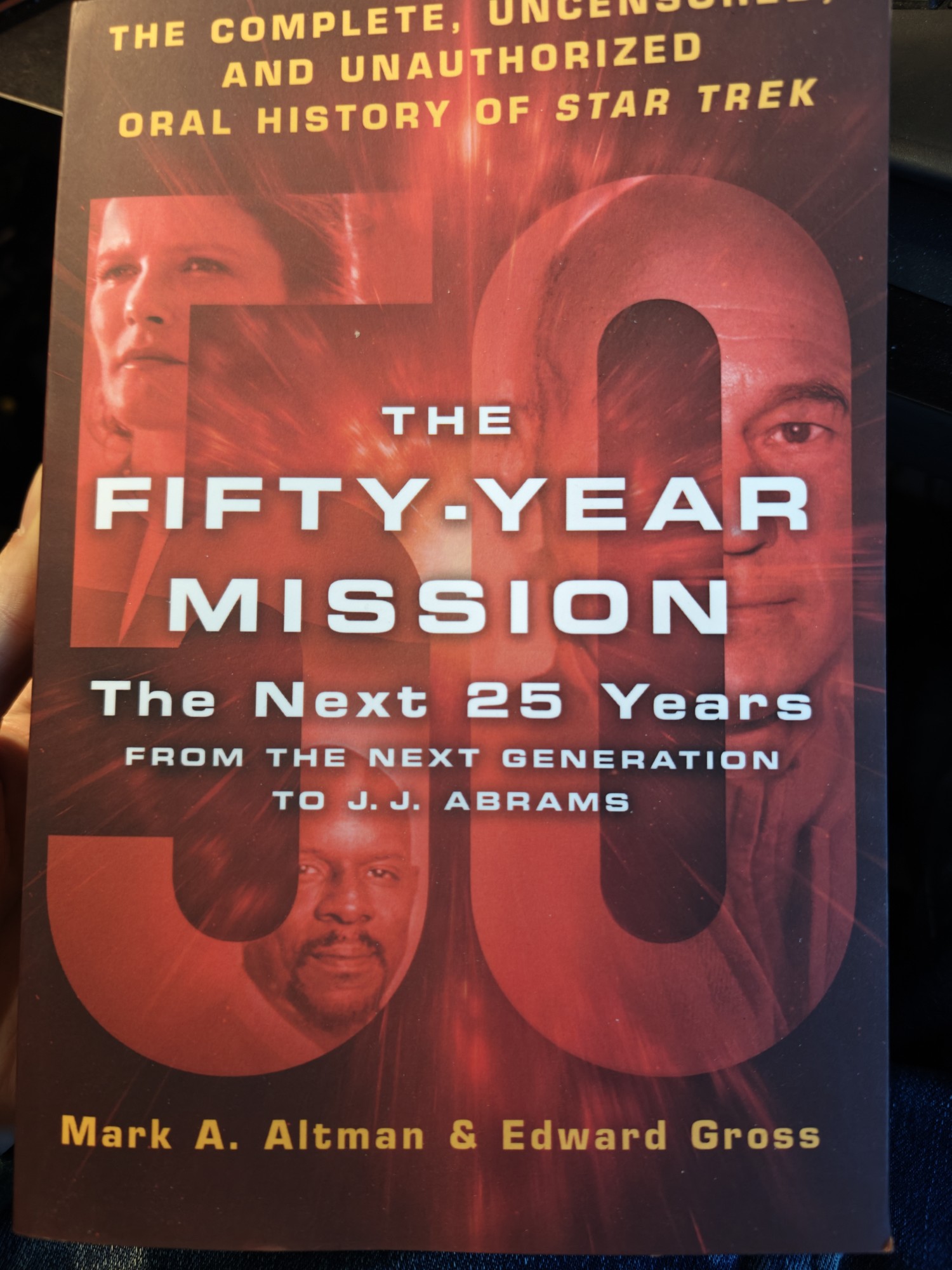 The front cover of a massive book called The Fifty Year Mission: The Next 25 Years From the Next Generation to J. J. Abrams which is about the history of Star Trek 