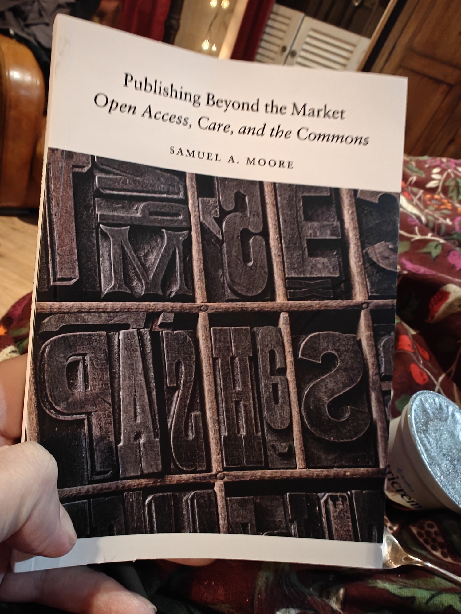 A copy of Samuel A Moore's Publishing Beyond the Market: Open Access, Care, and the Commons