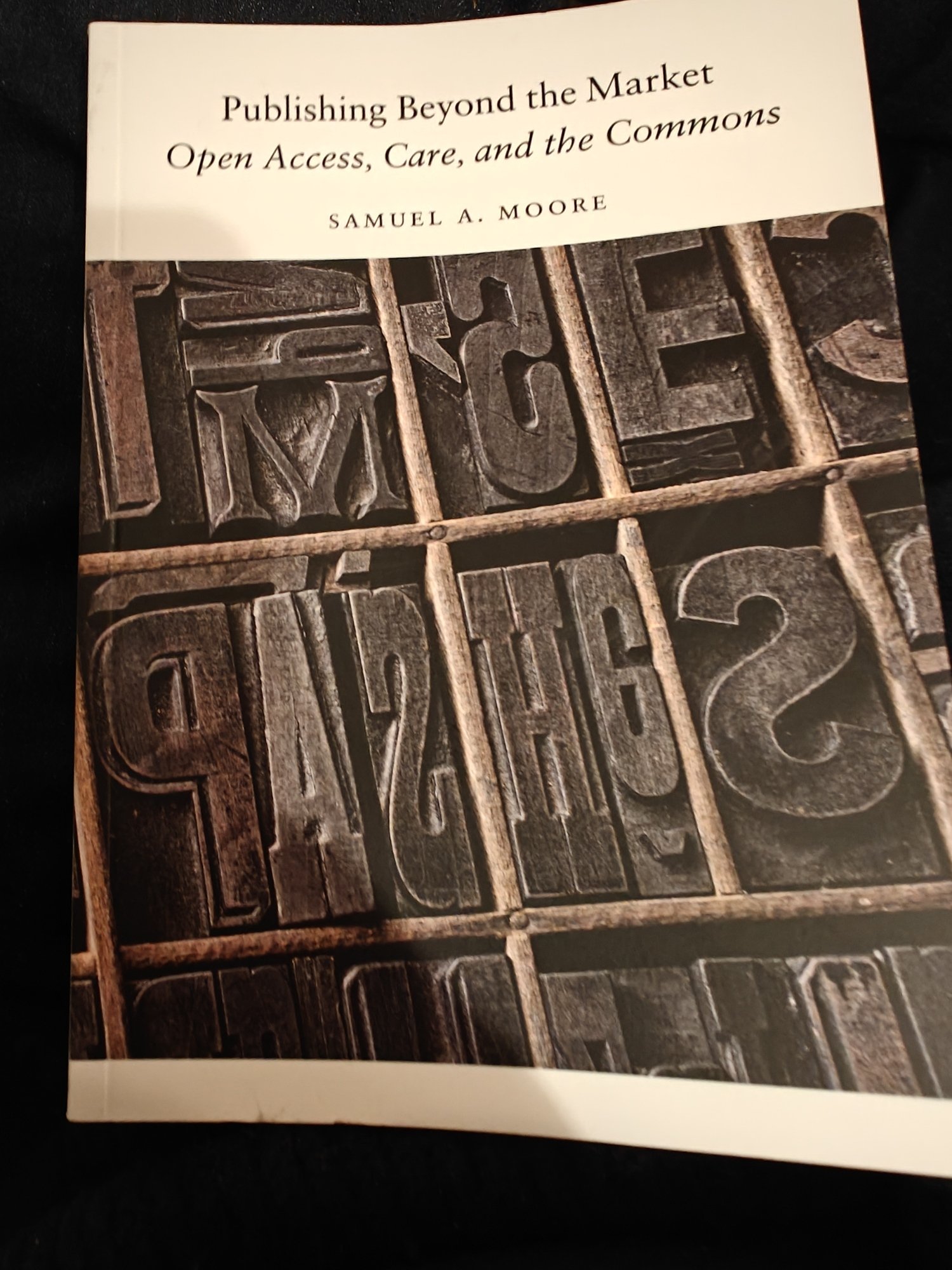 The cover to Samuel A Moore's Publishing Beyond the Market: Open Access, Care, and the Commons 