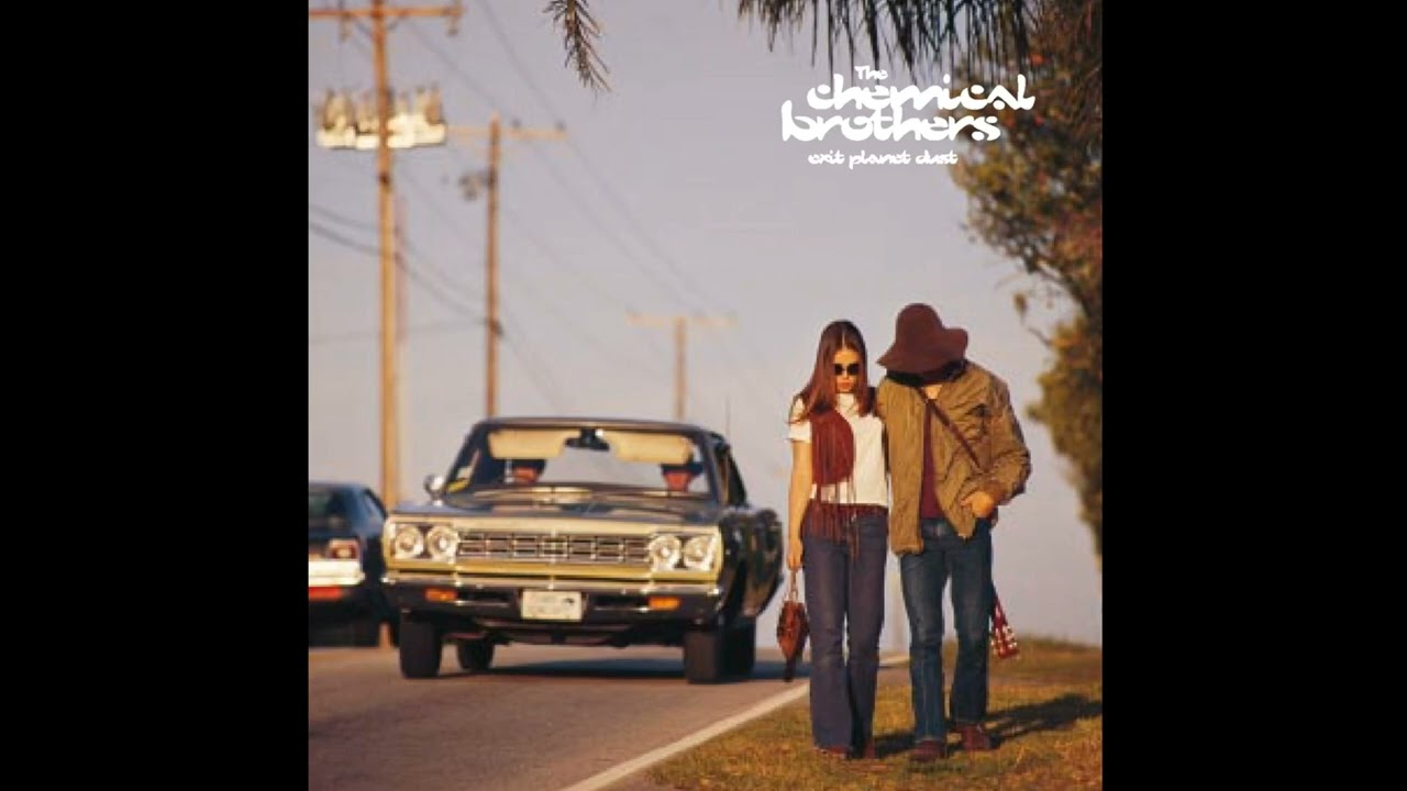 The cover of Exit Planet Dust featuring a car driving down a highway past a man and a woman walking on the side of the road. It is apparently a 1970s fashion photo reject.