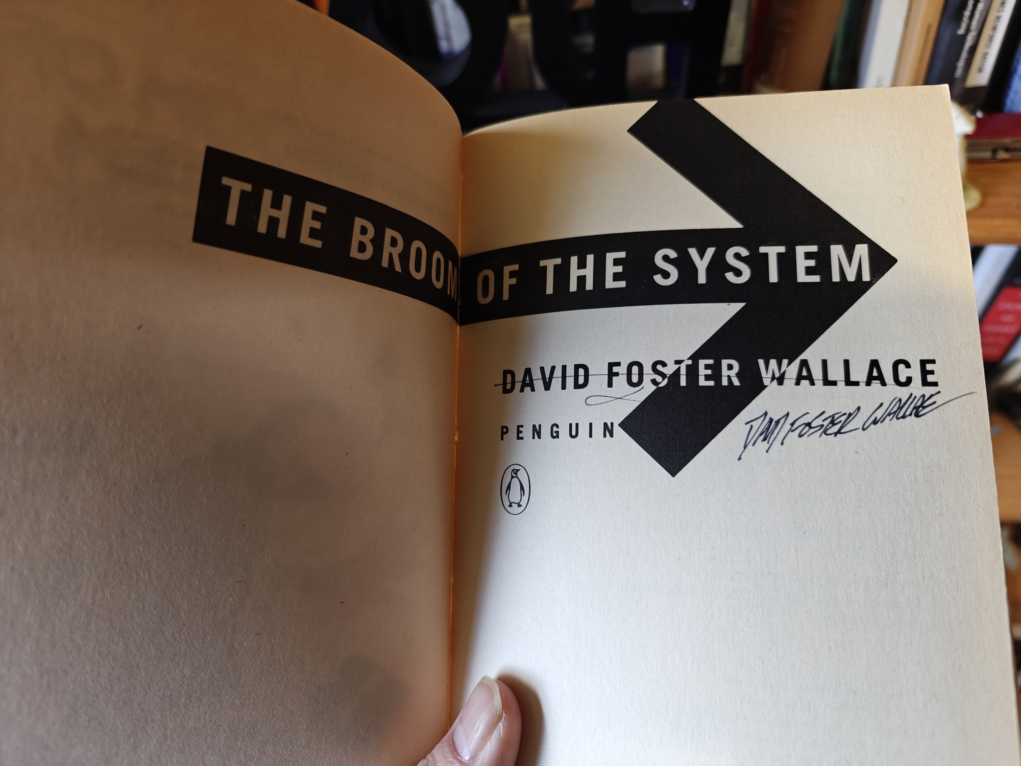 A signed copy of David Foster Wallace's The Broom of the System