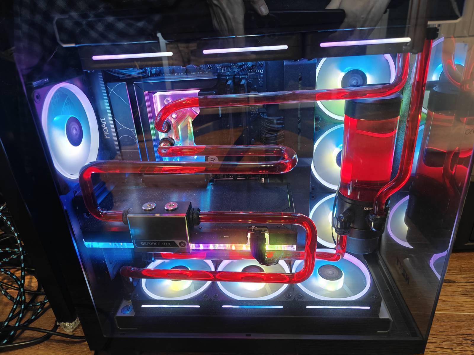 My watercooled PC with neon red coolant on display