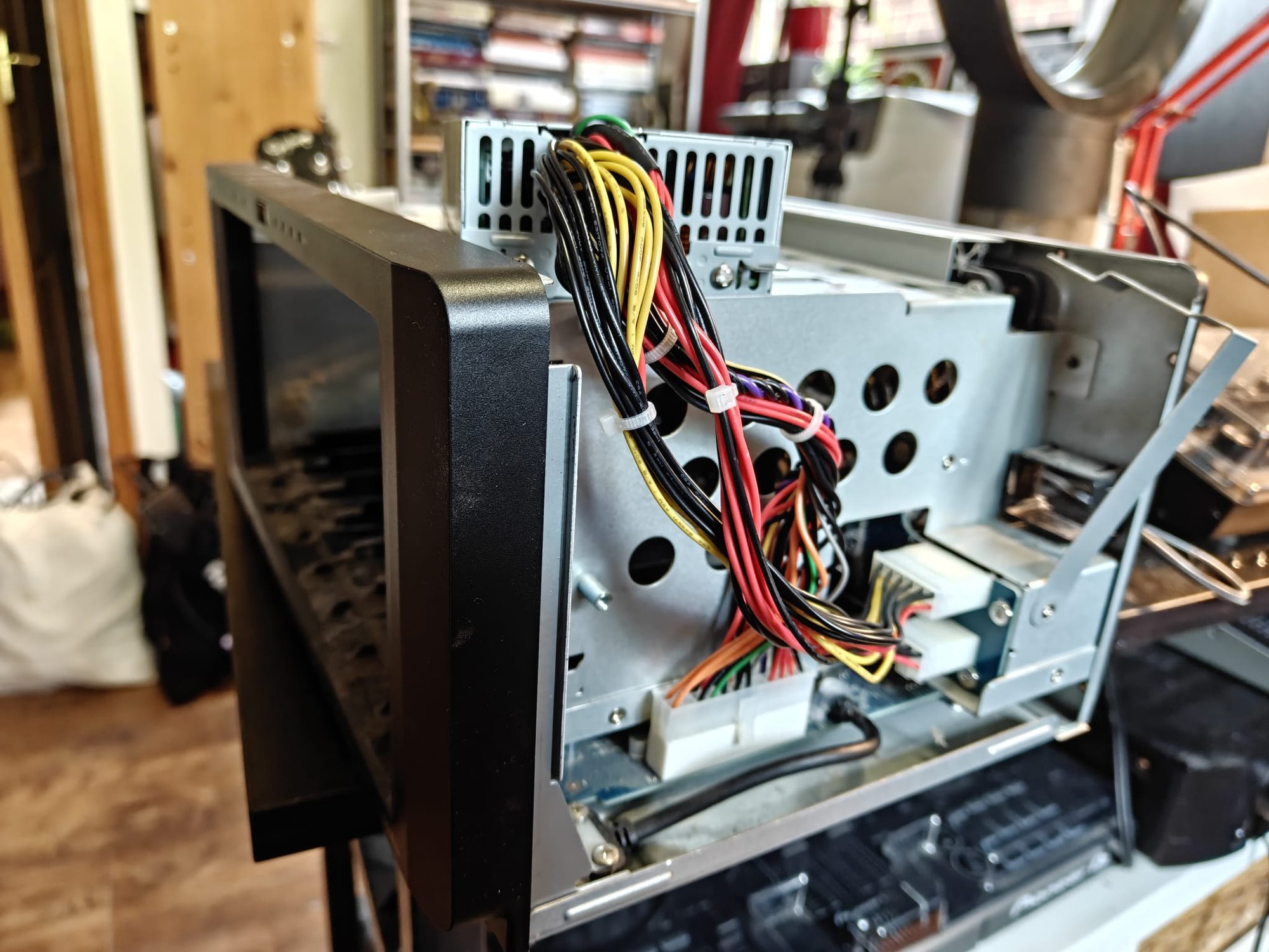 The inside of a Synology 1819+ NAS unit, with the power supply unit visible