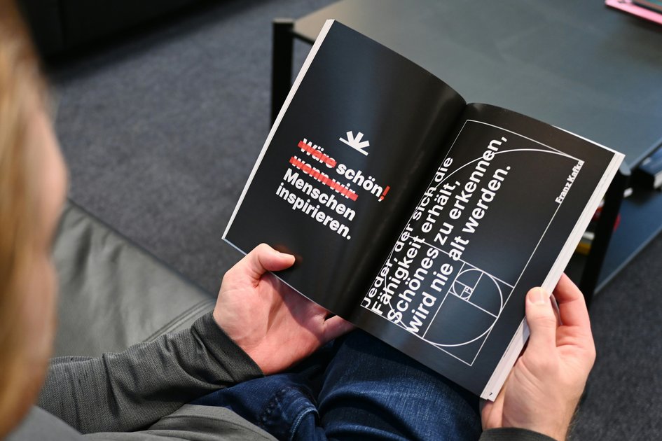 An image of someone reading a book