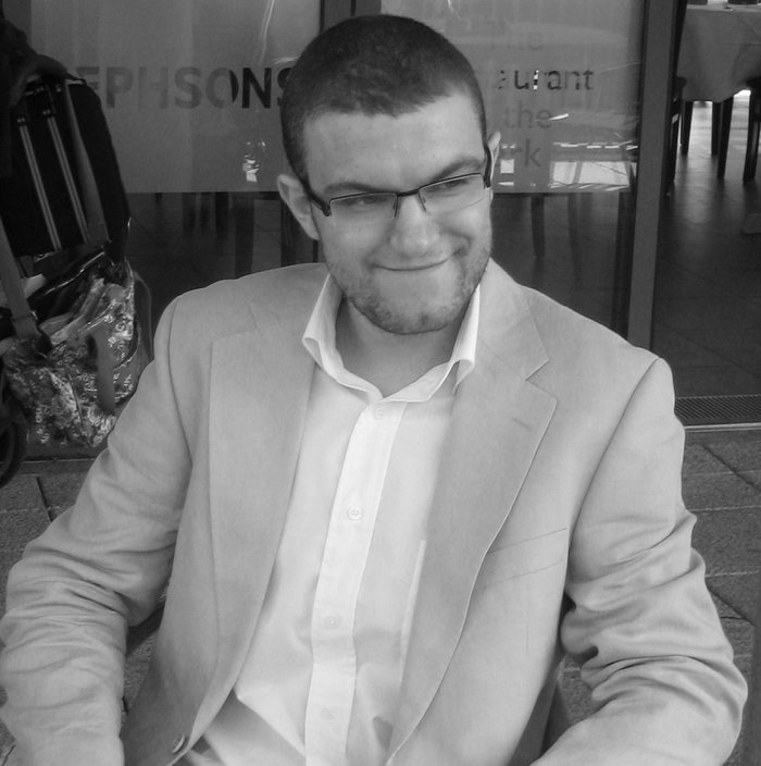 A greyscale image in a suit